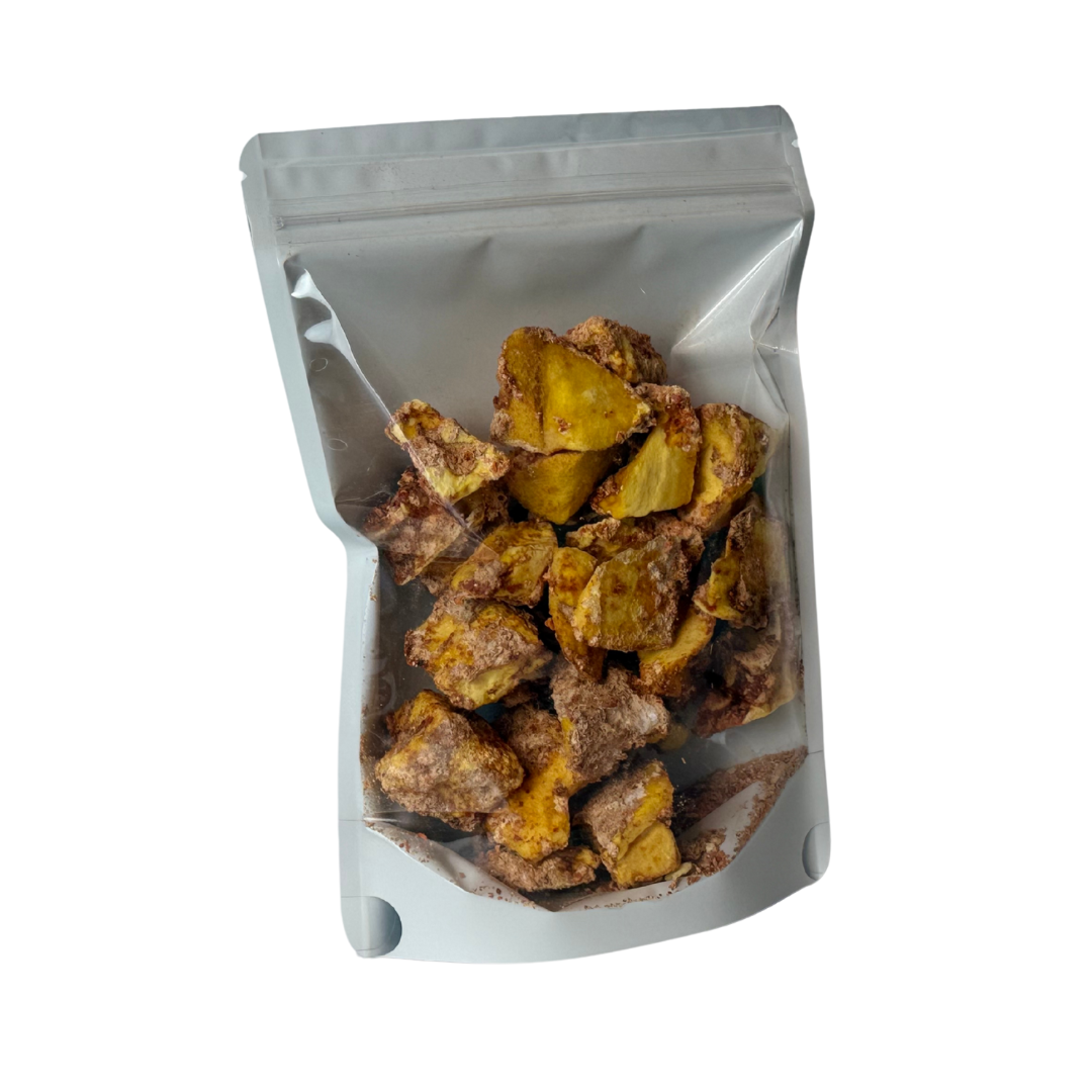 1 bag full of freeze dried mangos with Tajin